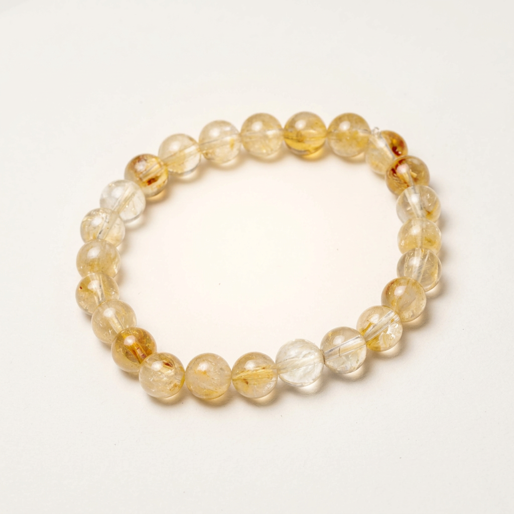 Close-up of a citrine gemstone jewelry piece on a matte warm bone background with soft radial glow and subtle shadows, showcasing luxury and positivity.